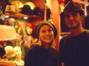 Trying on hats in the Village.